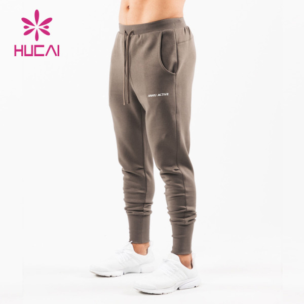 HUCAI Hot Sale Gym Sweatpants Pure Color Fabric Screen Printing Drawstring Joggers Supplier