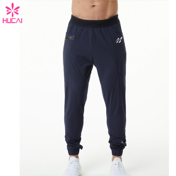 HUCAI ODM Gym Sweatpants Zipper Pockets Screen Printing Drawstring Joggers Manufacturer