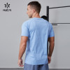HUCAI OEM Gym T Shirt Patchwork Mesh Silicone Heat Transfer Quick Dry Wicking Activewear Supplier