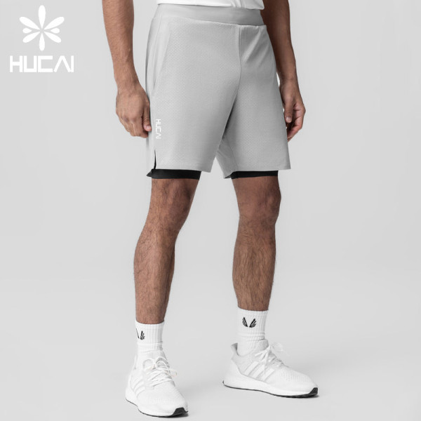 HUCAI Customized Men's Sportswear Laser Punching 2-in-1 Fitness Shorts Manufacturer